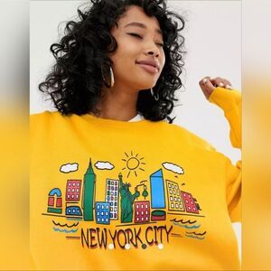 Womens yellow daisy street cropped New York sweat shirt